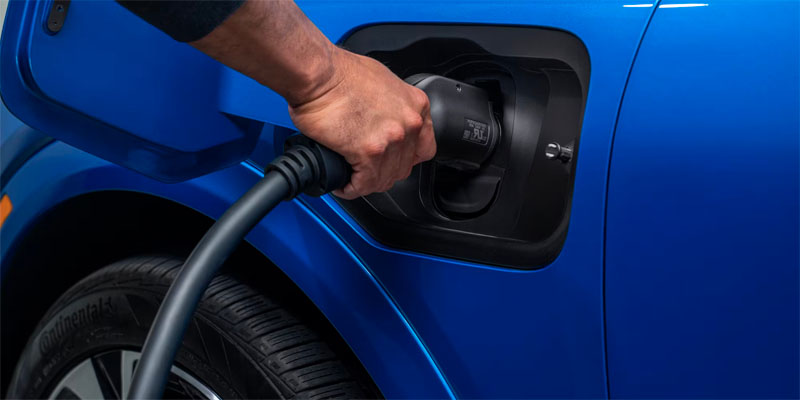 An owner charging their 2025 Chevrolet Equinox EV in Akron, OH