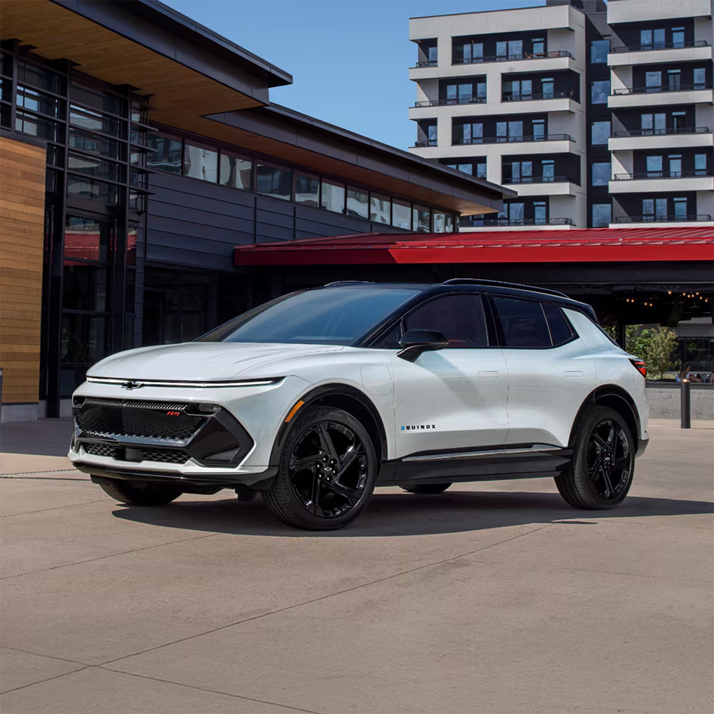 The 2026 Chevrolet Equinox EV parked outside of a chic shopping center in Akron, OH 