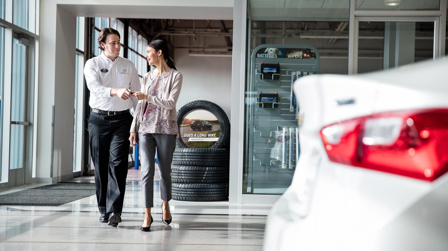 Chevrolet service advisor assisting customer