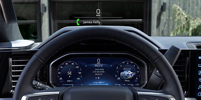 2026 Chevrolet Silverado 2500 HD instrument panel in Akron, OH, with a clear 12.3-inch driver display, offering essential driving information and customizable settings for a smooth and controlled driving experience.