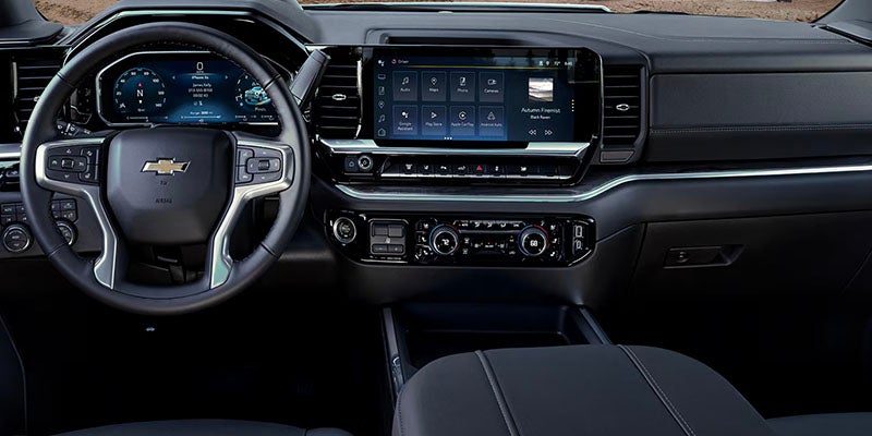 2026 Chevrolet Silverado 2500 HD interior in Akron, OH, with premium materials, Crew Cab configuration, leather-appointed seating, dual-zone climate control, and ample storage for work crews or family trips.