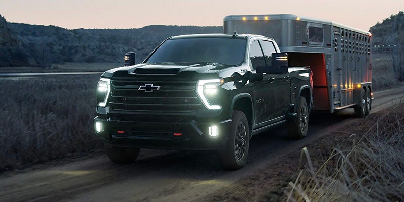2026 Chevrolet Silverado 2500 HD performance in Akron, OH, with a powerful 6.6L V8 engine, available Duramax® Turbo-Diesel V8, up to 22,500 lbs. gooseneck towing capacity, and smooth Allison® 10-speed automatic transmission.