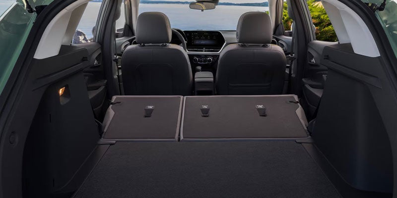 2026 Chevrolet Trax rear seats folded down to create versatile cargo space for Akron, OH drivers