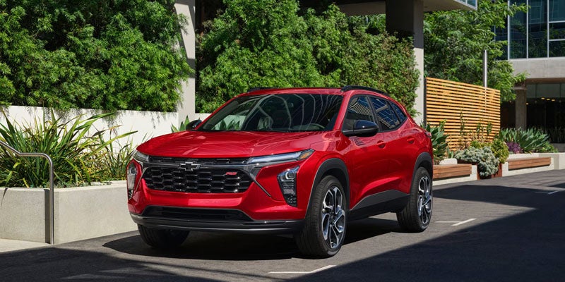 2026 Chevrolet Trax parked along a city street in Akron, OH highlighting compact SUV maneuverability