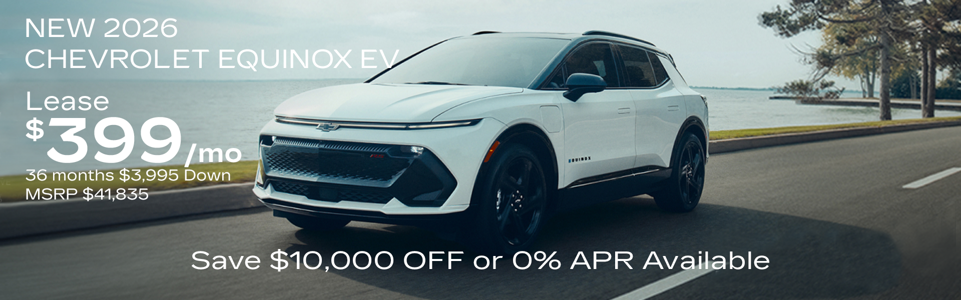 Silver Equinox ev on road. Santa in sunglasses in red car